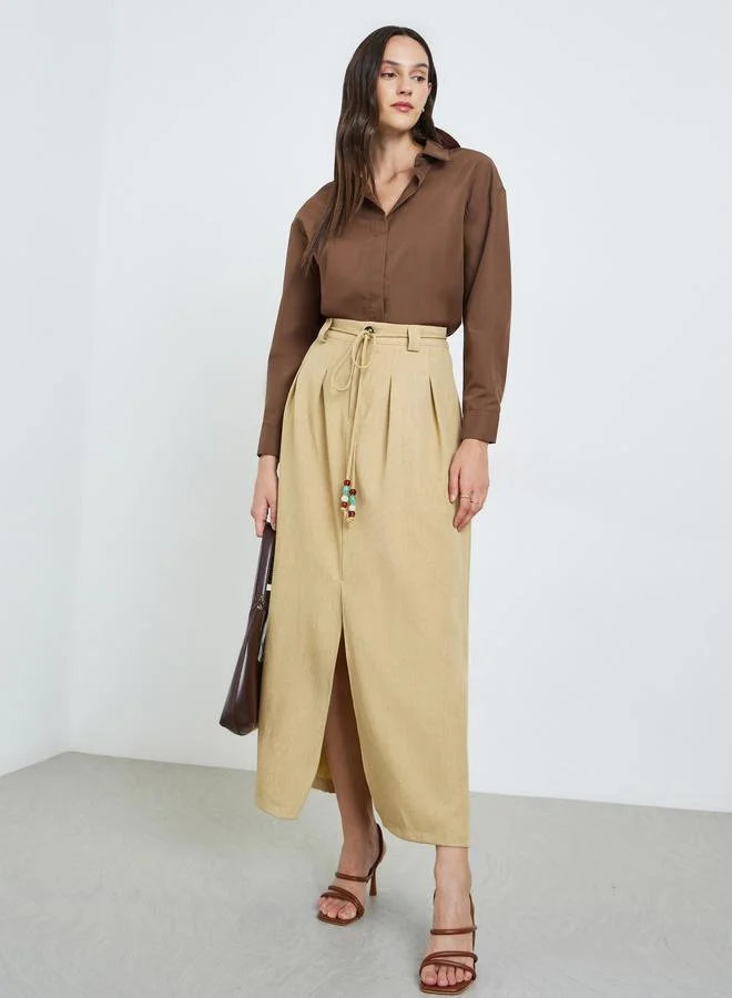 تايك تو Women's solid Pleated Detail Tie Waist Slit Cut Skirt