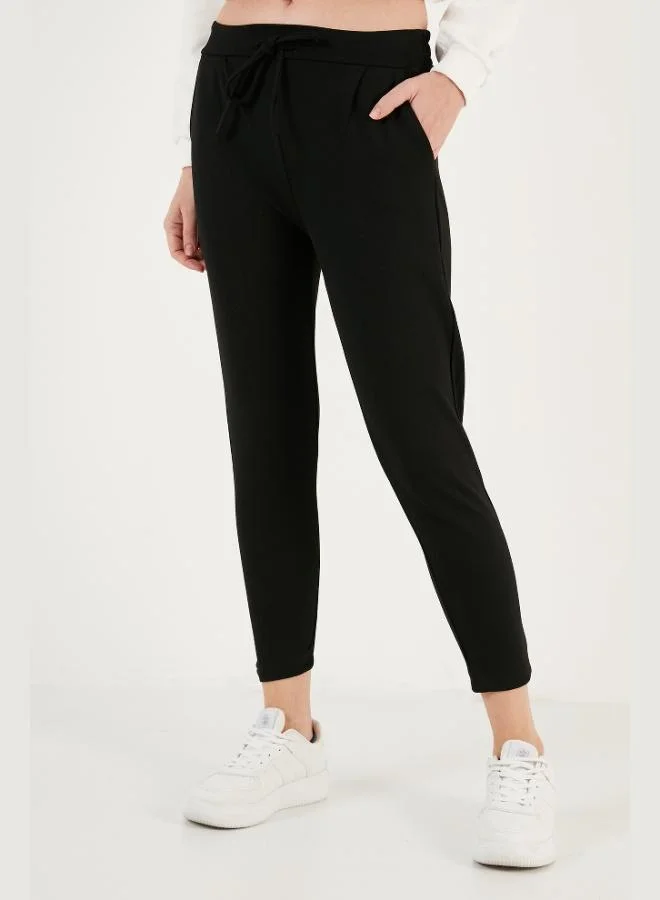 ليلا بنطلون ليلا بجيوب ورباط خصر نسائي