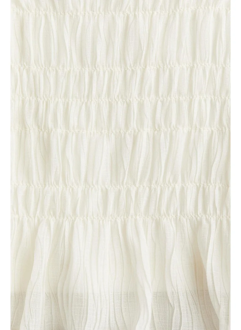H&M Smocked peplum top