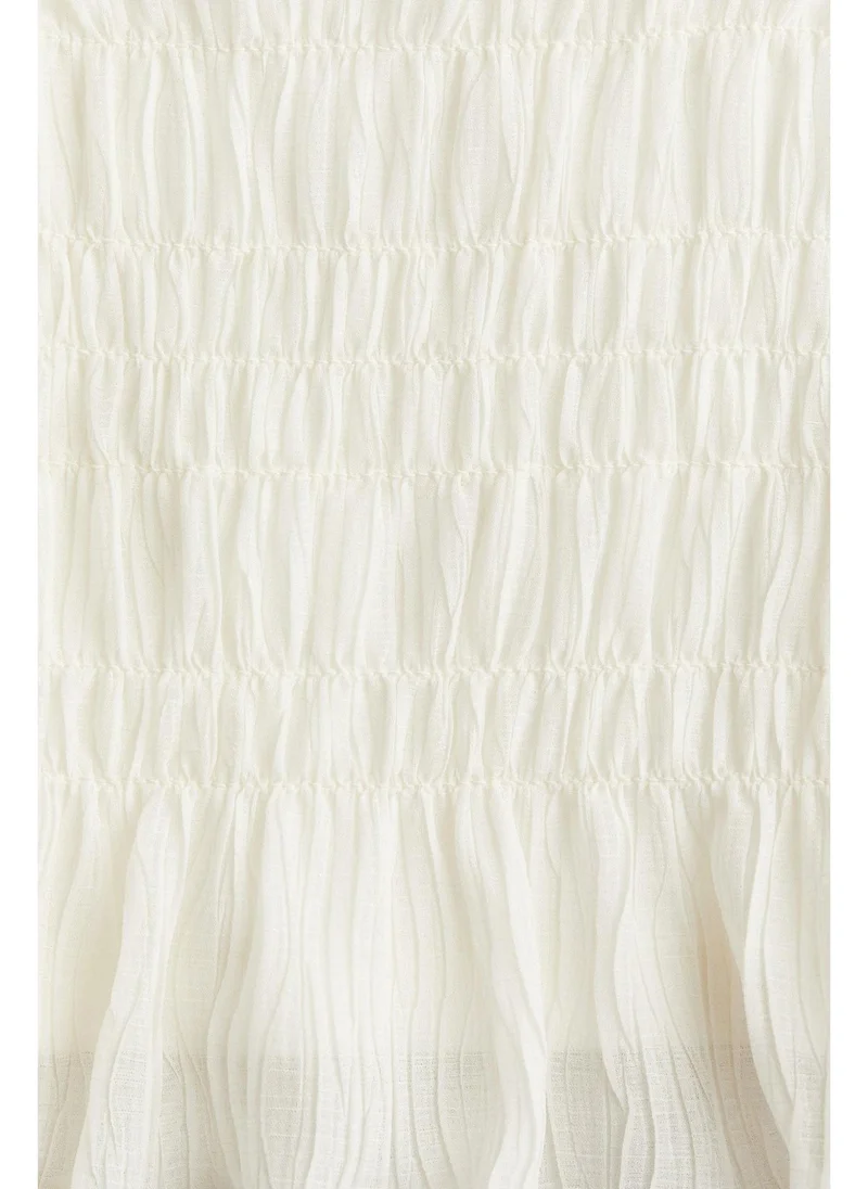H&M Smocked peplum top