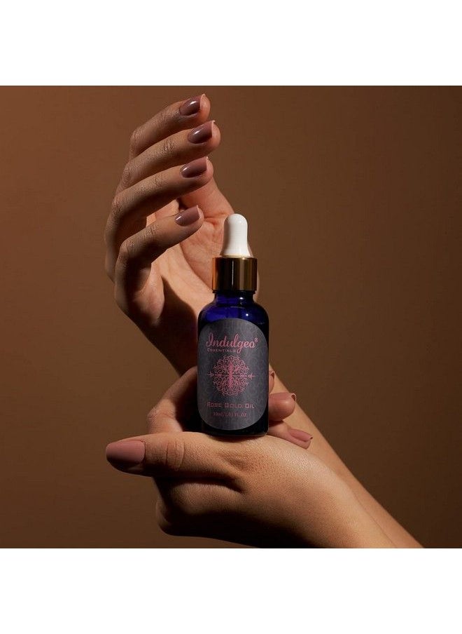 Indulgeo ESSENTIALS - زيت الجمال الوردي الذهبي (30 مل)؛ برايمر مكياج خفيف معزز بالذهب عيار 24 قيراط؛ لمكافحة الشيخوخة؛ سيروم توهج فوري؛ لجميع أنواع البشرة؛ زيت فيتامين سي الطبيعي وزيت بذور الورد - Image 1