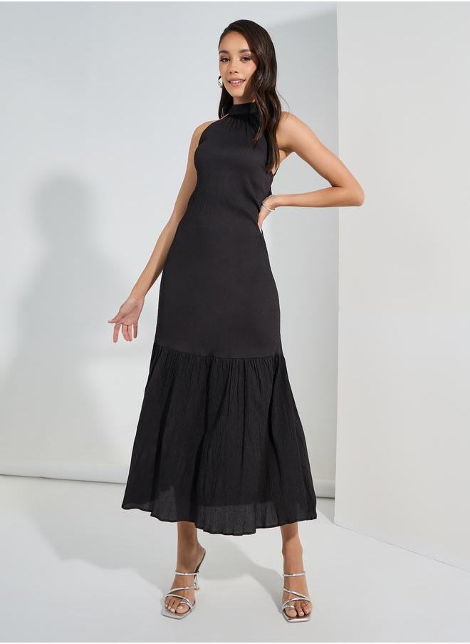 Styli Textured Halter Neck A-Line Maxi Dress  - Image 1
