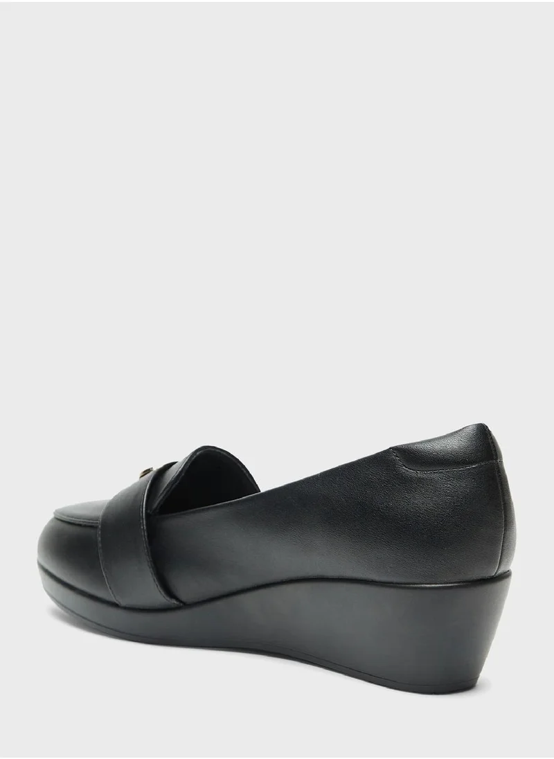 Celeste Close Toe Mid Heel Pumps