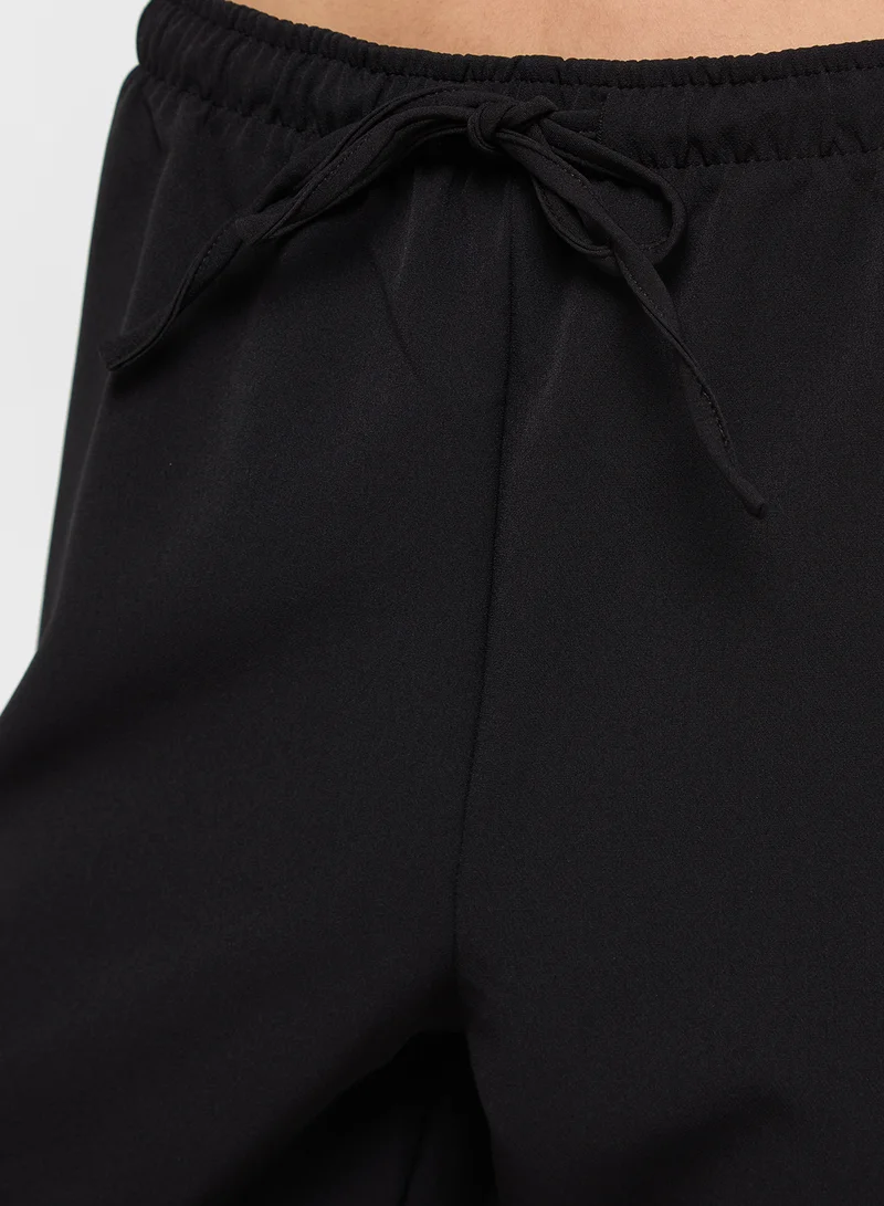 نا-كد Cropped Pants