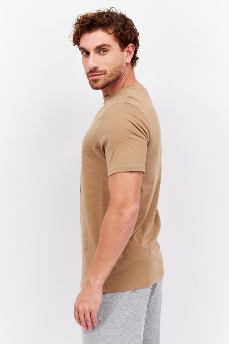 PUMA Men Sportswear Fit Short Sleeves Outdoor T-shirt, Tan  - Image 2