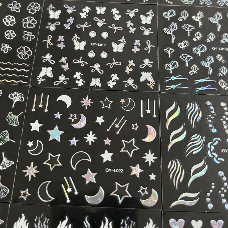 TOGZOM 30 Sheet Silver Nail Art Stickers 3D Self-Adhesive Nail Decals Star Moon Flower Leaf Stripe Design Aurora Laser Nail Stickers Heart Butterfly Nail Art Supplies DIY Nail Decoration for Women - Image 5