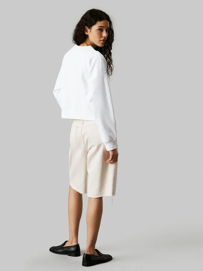 Calvin Klein Jeans Bright White Monogram Logo French Terry Relaxed Sweatshirt for Women | Best Price UAE