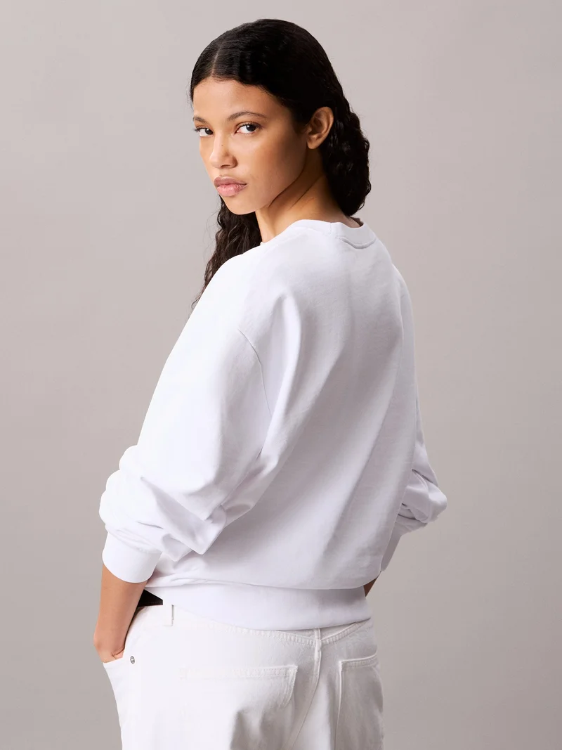 Calvin Klein Jeans Bright White Monogram Logo French Terry Relaxed Sweatshirt for Women | Best Price UAE