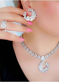A luxurious design of a diamond jewelry set inspired by foliage, featuring a stunning necklace, sparkling earrings, and an elegant ring that exudes sophistication and elegance."