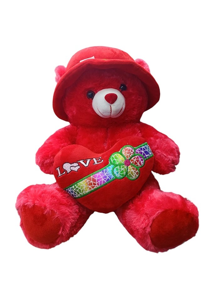 Generic - A red teddy bear with a heart and a cap - Image 1