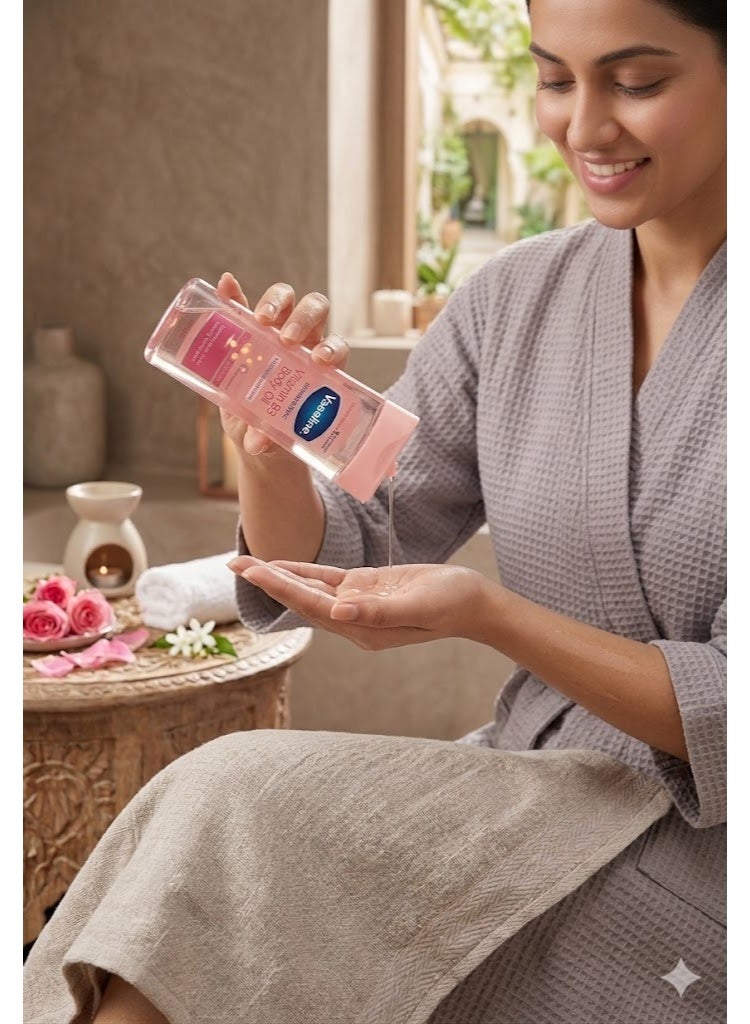 فازلين زيت الجسم فازلين إنتينسيف كير الوردي - فازلين بودي أويل بفيتامين B3 لترطيب وتفتيح البشرة ومعالجة جلد الإوزة - 200 مل - Image 3