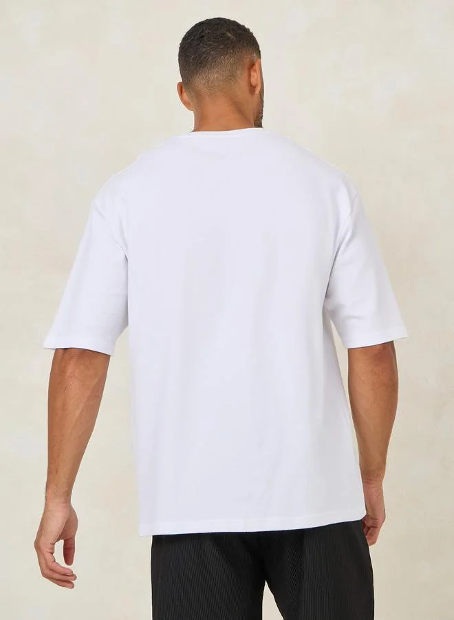 Styli Premium Textured Knit Embroidered Oversize T-Shirt