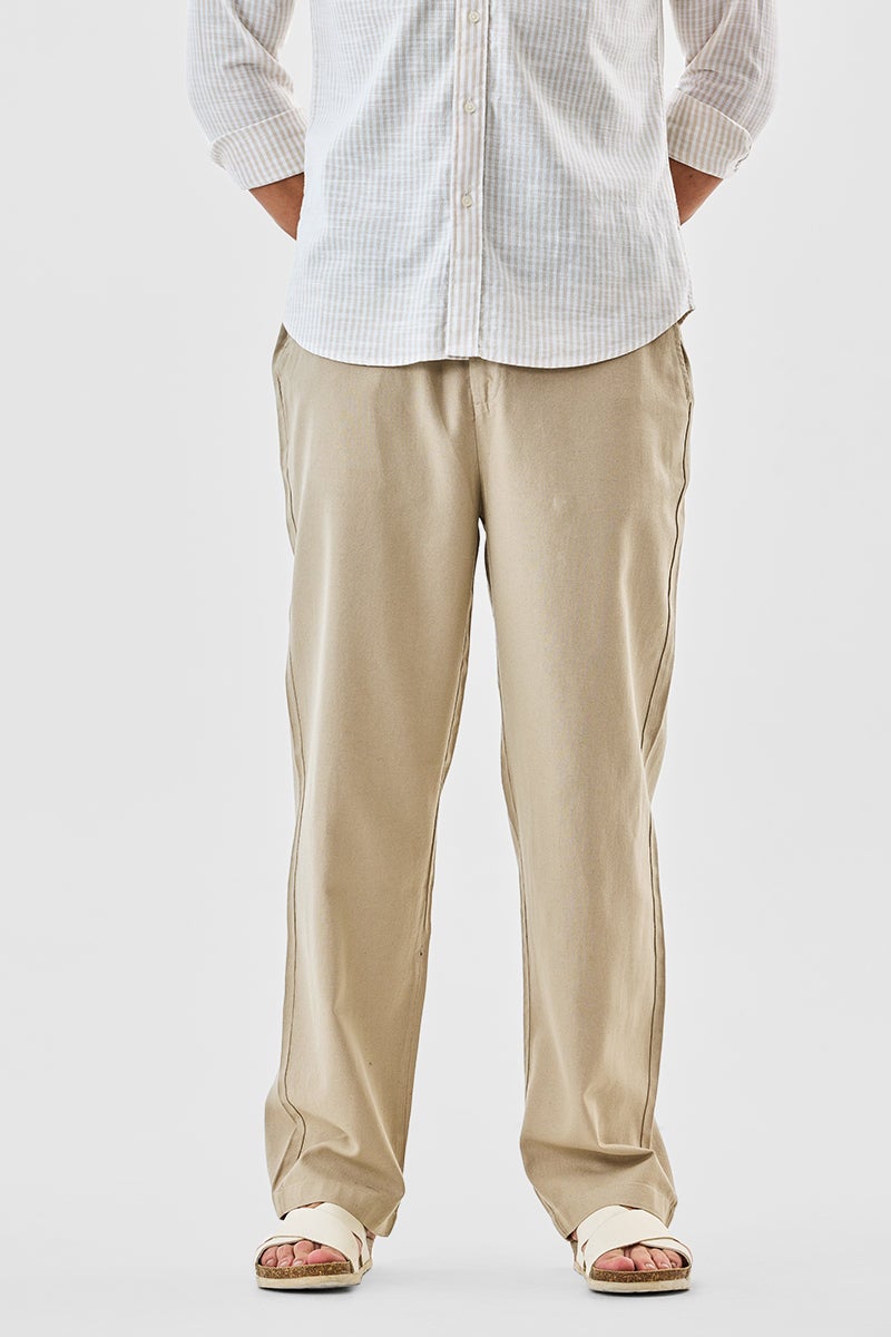 SNITCH Beige Solid Relaxed Casual Trousers - Image 1