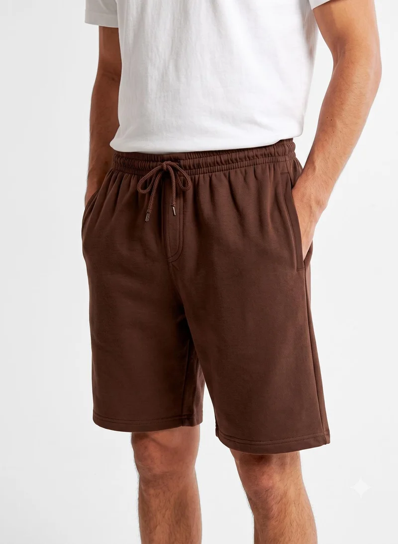 Seventy Five Basics  Regular Fit Pocket Shorts for Men | Best Price UAE