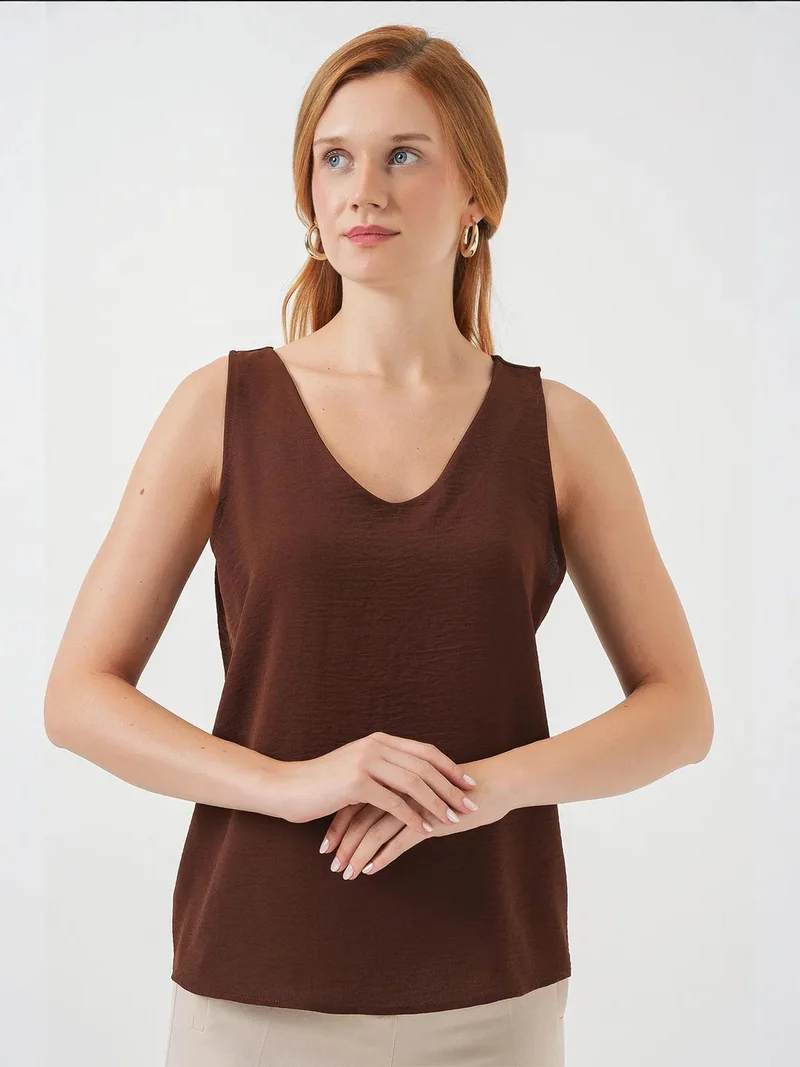 بيغ دارت بلوزة بياقة على شكل حرف  من