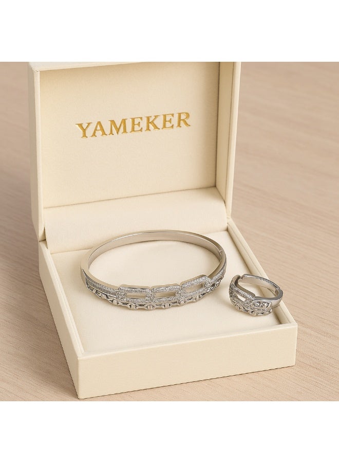 ياميكر طقم سوار وخاتم نسائي باللون الفضي من YAMEKER.AE | مجوهرات بتصميم سلسلة فاخرة مرصّعة بحجر الزركون CZ | طلاء روديوم مع خاتم بمقاس ثابت وسوار مفتوح | هدية مناسبة للحفلات والزفاف والعيد للنساء والفتيات - Image 2