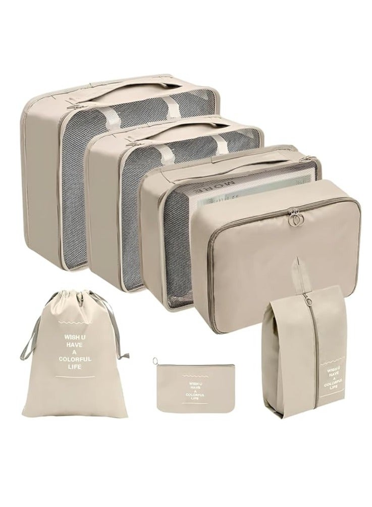 7-piece travel bag organizer in different sizes for organizing accessories and clothes, beige color - Image 1