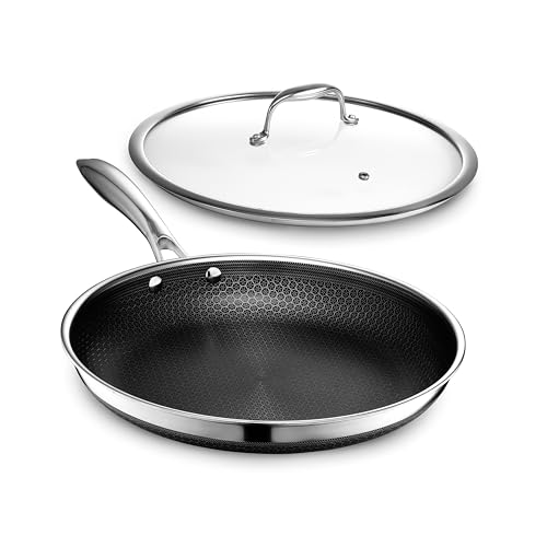 HexClad مقلاة هيكس كلايد الهجينة غير اللاصقة 12 بوصة مع غطاء زجاجي مقسى، مقبض بارد، آمنة في غسالة الصحون، آمنة في الفرن حتى 900°F، جاهزة للحث، متوافقة مع جميع أسطح الطهي - Image 1