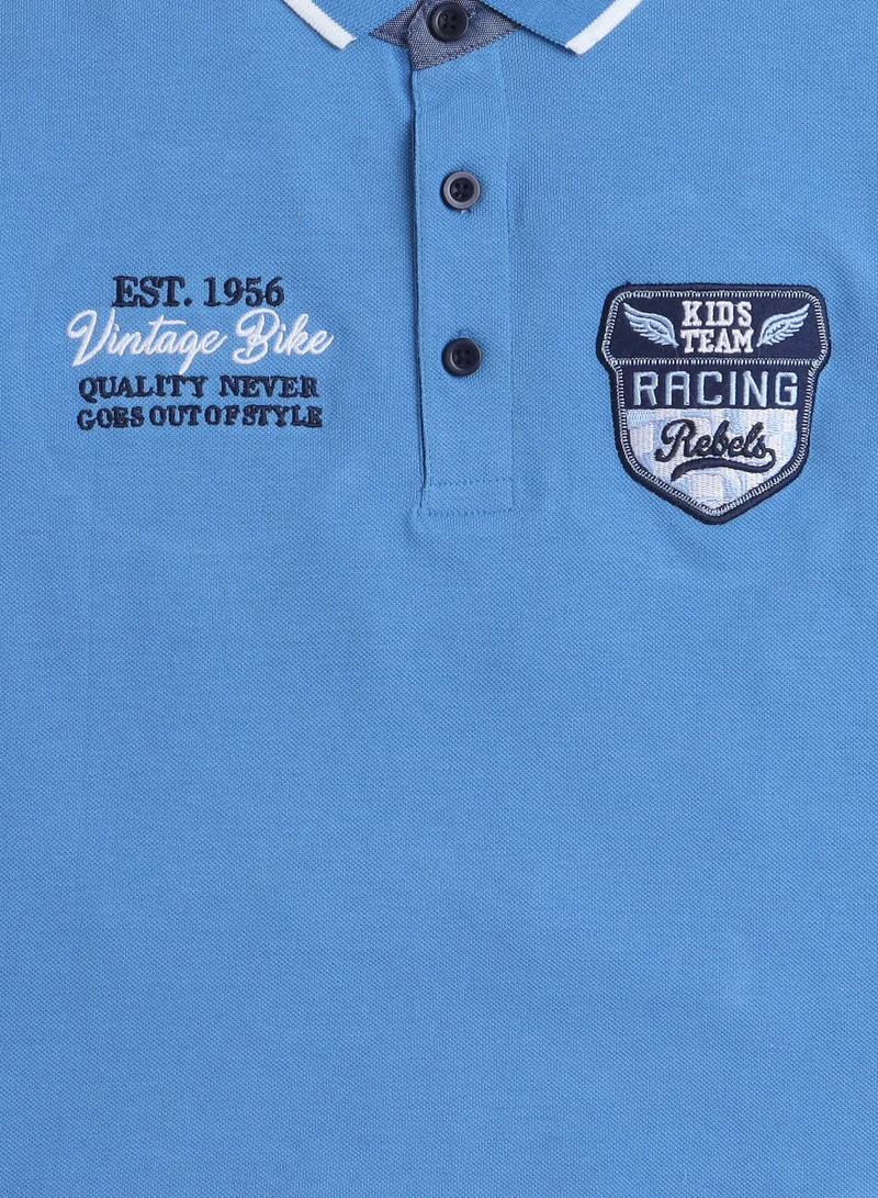 victor and jane Senior Boys' Polo T-Shirt – Blue colour with Embroidered Label detail