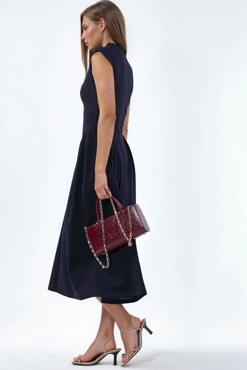 بوسيم BUSEM Textured Paneled Midi Dress