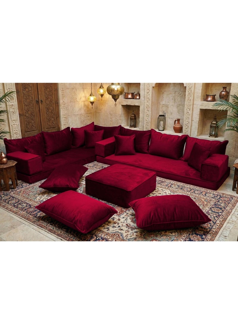 اكس بوت طقم كنبة مجلس عربي أرضي تقليدي يتميز بوسائد مخملية فاخرة بلون عنابي غني. صُمم ليجمع بين الراحة والأناقة، ويشمل وسائد ظهر سميكة، ووسائد أرضية، وعثمانية (بوف) وسطية متناسقة، مما يجعله مثاليًا لغرف المعيشة أو المجالس أو مساحات الاسترخاء. يضفي لمسة دافئة وفاخرة بطابع شرق أوسطي على أي ديكور داخلي. - Image 4