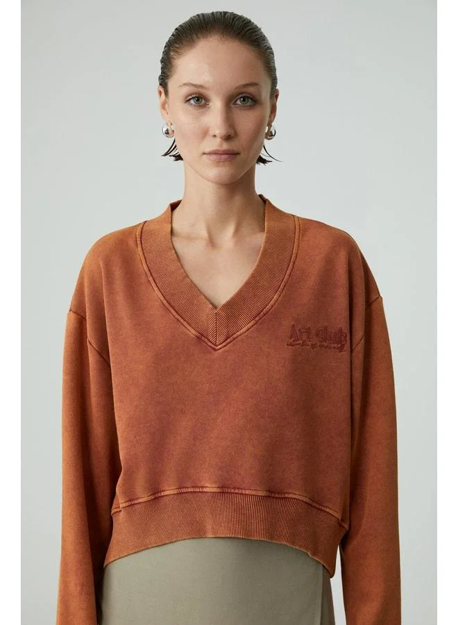 GRIMELANGE ANDREITA Women's V-Neck Asymmetric Oversize Orange Sweatshirt.