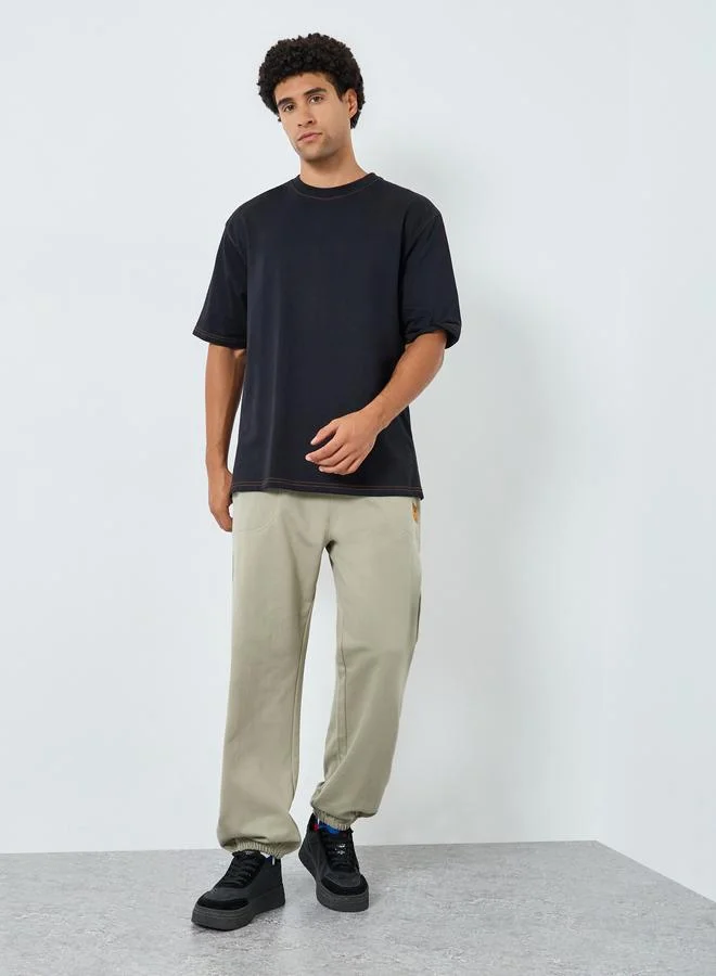 Styli Men Black Crew Neck T-Shirt with Contrast Stitching