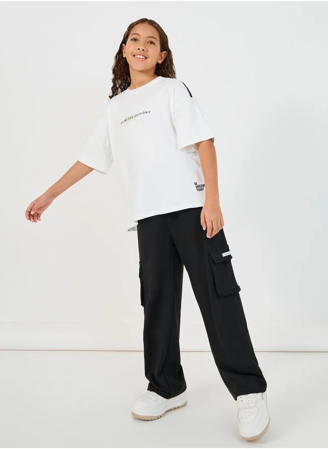 ستايلي Slogan Print T-Shirt with Patch Work Detail & Crago Pants Co-Ords