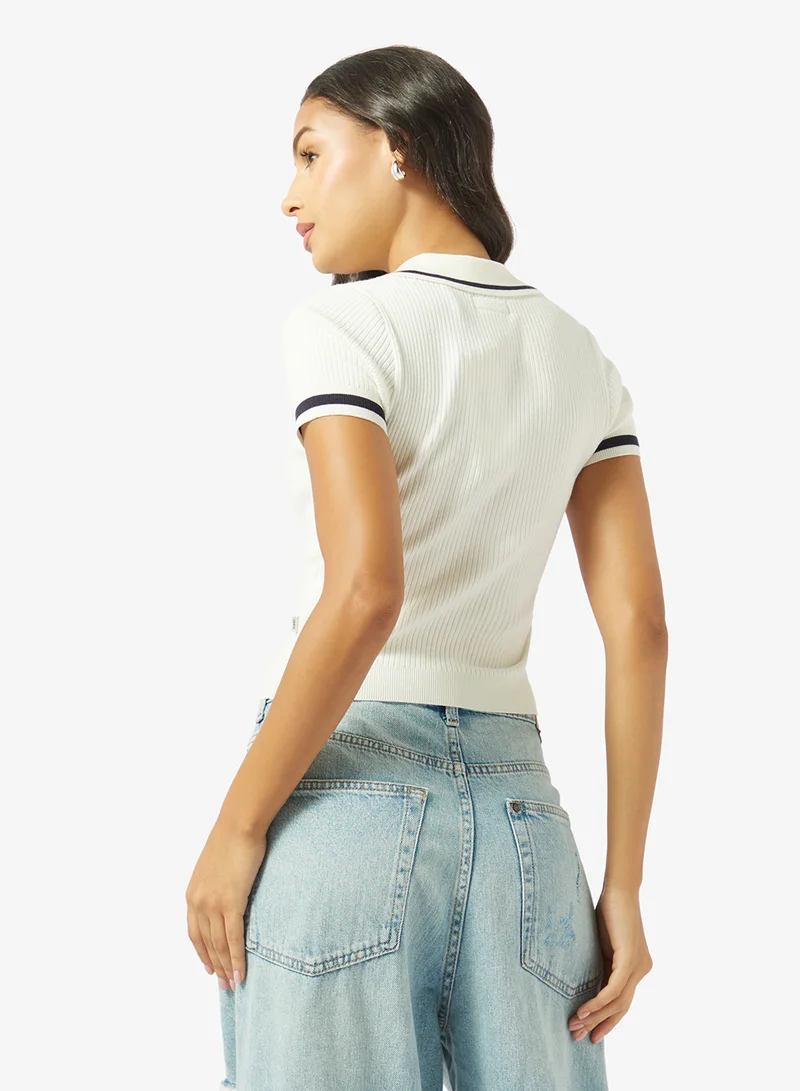 جيس جينز كنزة بياقة بولو