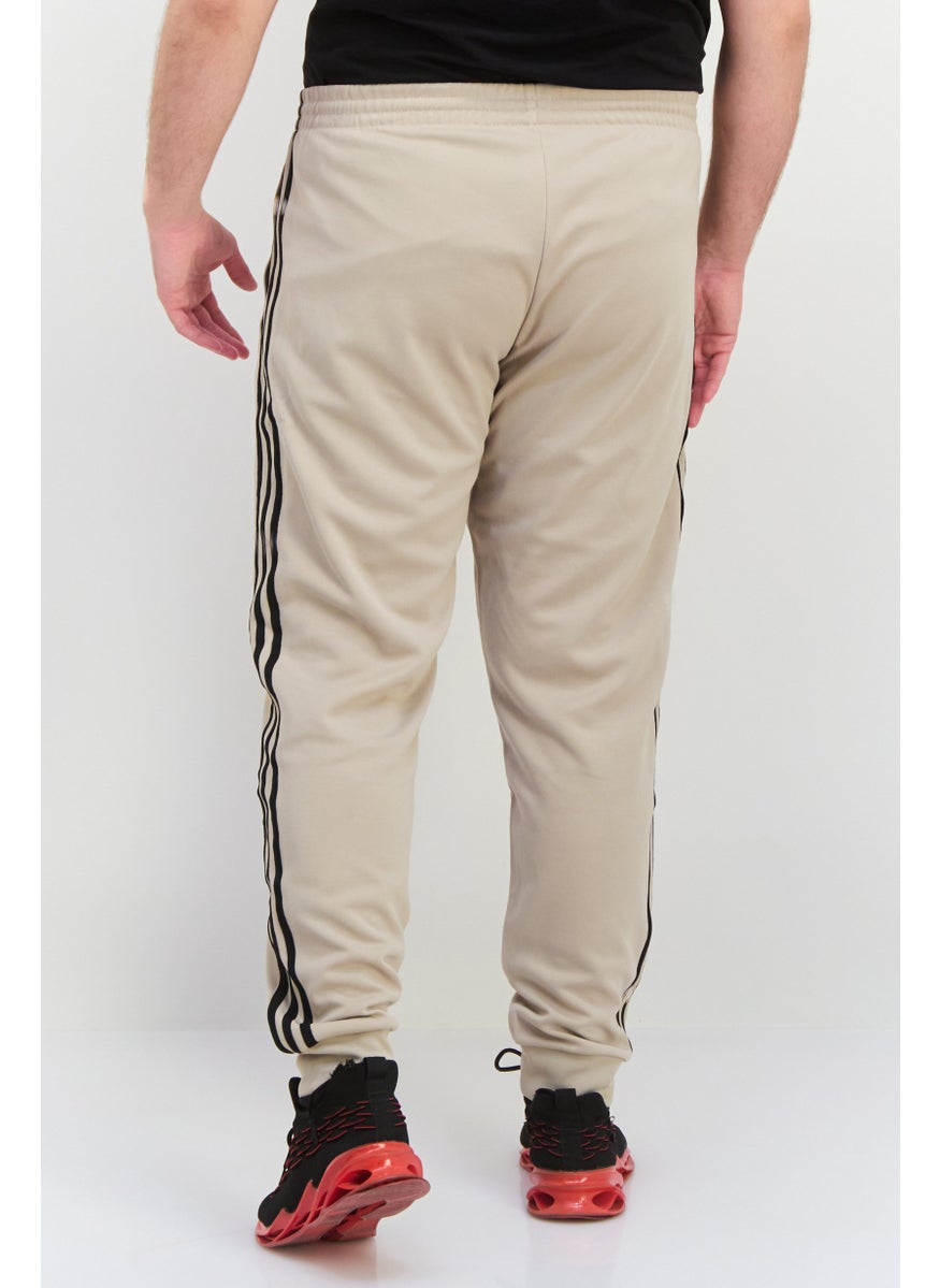 adidas Originals - Men Sportswear Fit Embroidered  Logo Outdoor Sweatpants, Beige - Image 1