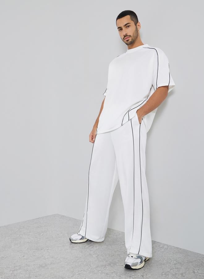 Styli Men White Oversized Piping Detail T-Shirt and Pants Co-Ords - Image 1