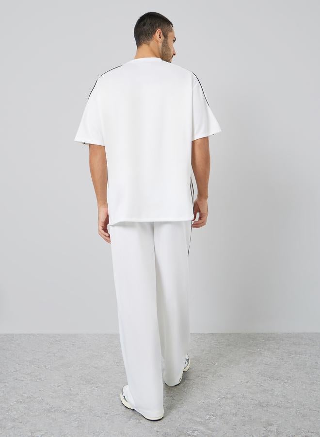 Styli Men White Oversized Piping Detail T-Shirt and Pants Co-Ords - Image 5