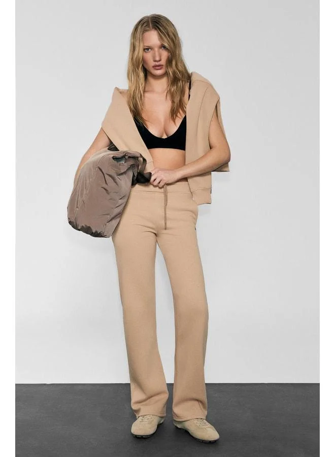 URBAN BEAT CLAYT Women's Fleece-Lined Soft-Fabric Double-Pocket Relaxed Mink Sweatpants with Print Details.