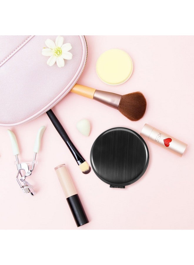 داينيبي مرآة مدمجة من الفولاذ المقاوم للصدأ 【ليست زجاجية】 مرآة جيب للمكياج للحقائب، مرآة يد صغيرة محمولة متينة ومقاومة للسقوط ومرآة مزدوجة الجوانب للرجال والنساء والفتيات (أسود) - Image 3