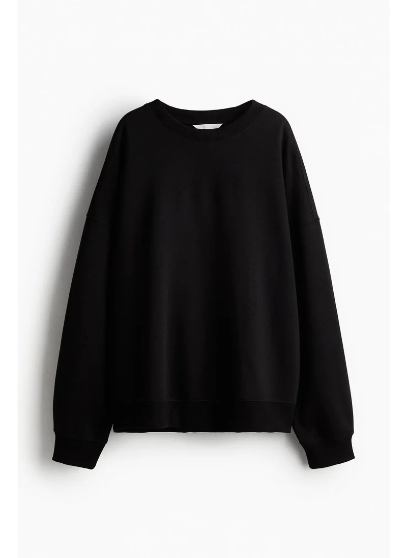 H&M Black Dark Oversized sweatshirt for Women | Best Price UAE