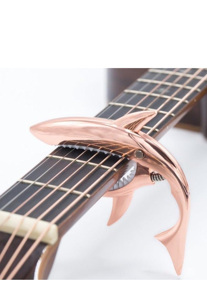 Shark Capo for Acoustic and Electric Guitar – Made of durable zinc alloy, this capo is designed for 6-string guitars, offering a comfortable grip, no fret buzz, and a stunning rose gold finish.