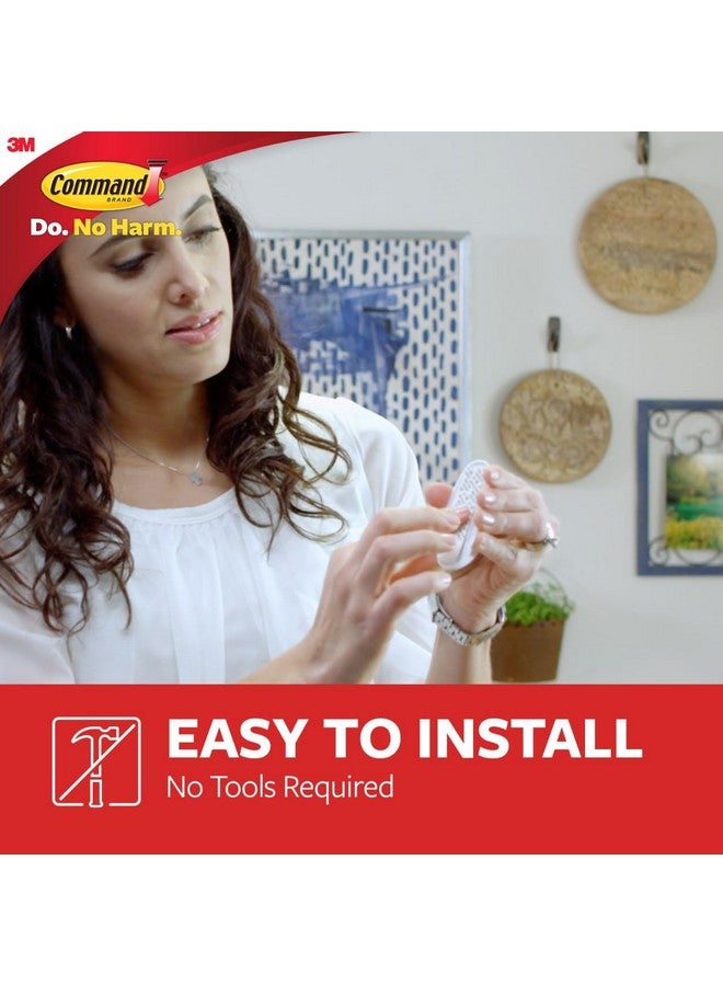 كوماند خطافات Command متوسطة الحجم، خطافات حائط معلقة مقاومة للتلف مع شرائط لاصقة، خطافات حائط بدون أدوات لتعليق الأغراض التنظيمية في أماكن المعيشة، 9 خطافات بيضاء و12 شريط Command - Image 4