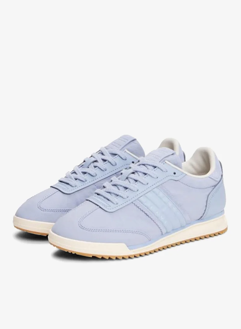 تومي جينز سنيكرز رانر منخفض