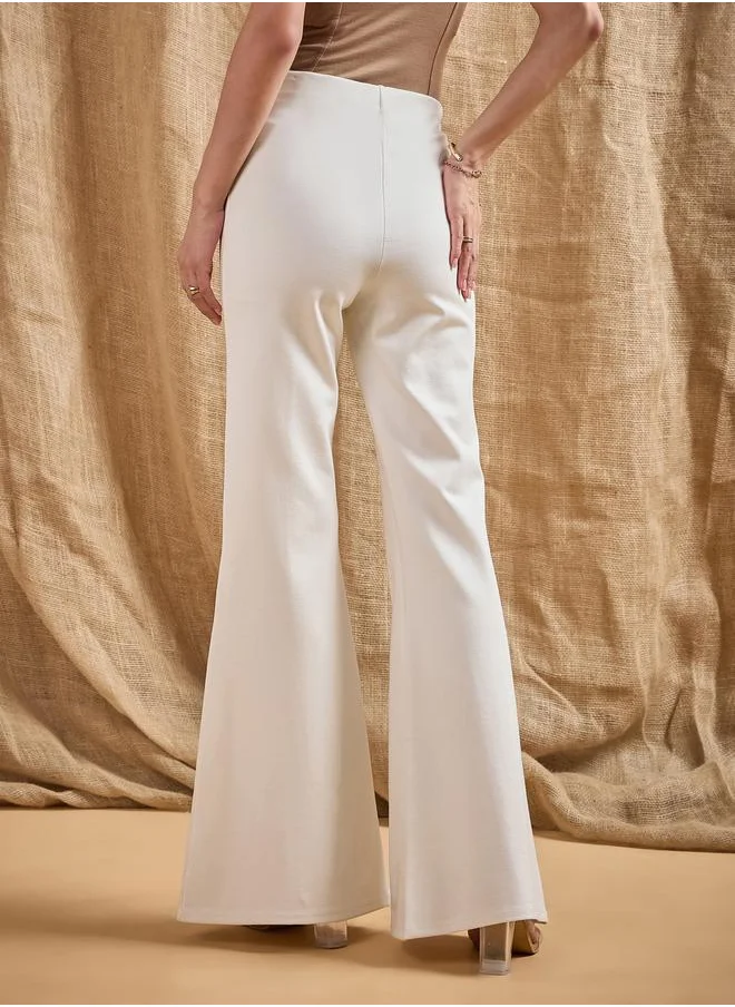 SASSAFRAS Front Button Flared Bell Bottom Pants by Styli