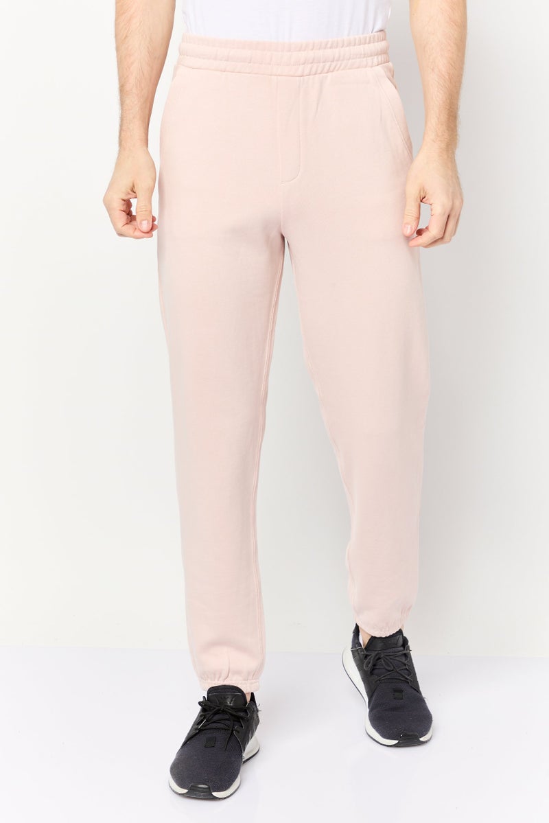 Celio سروال جوجر للرجال بتصميم فضفاض مع حبل سحب، وردي - Image 1