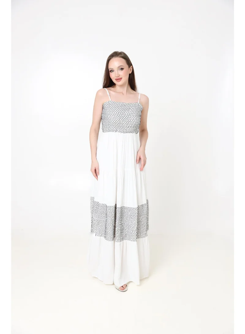 2Trendy Women's White Maxi Dress with Thin Straps, Black Embroidery and Tie Back