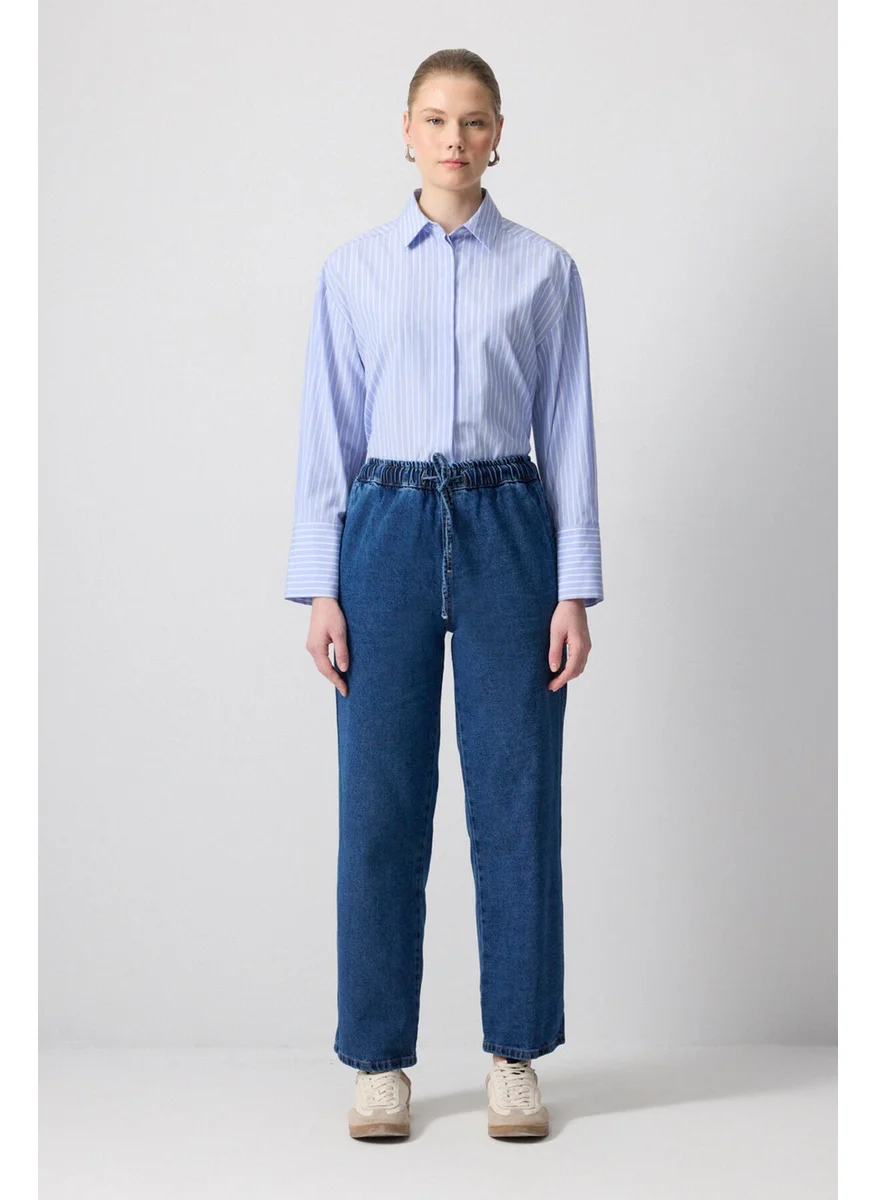 تاتشي Elastic Waist Denim Trousers