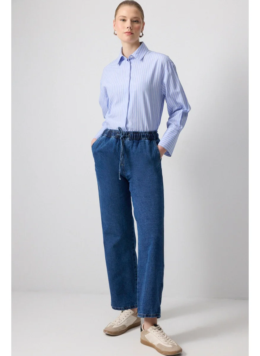 تاتشي Elastic Waist Denim Trousers