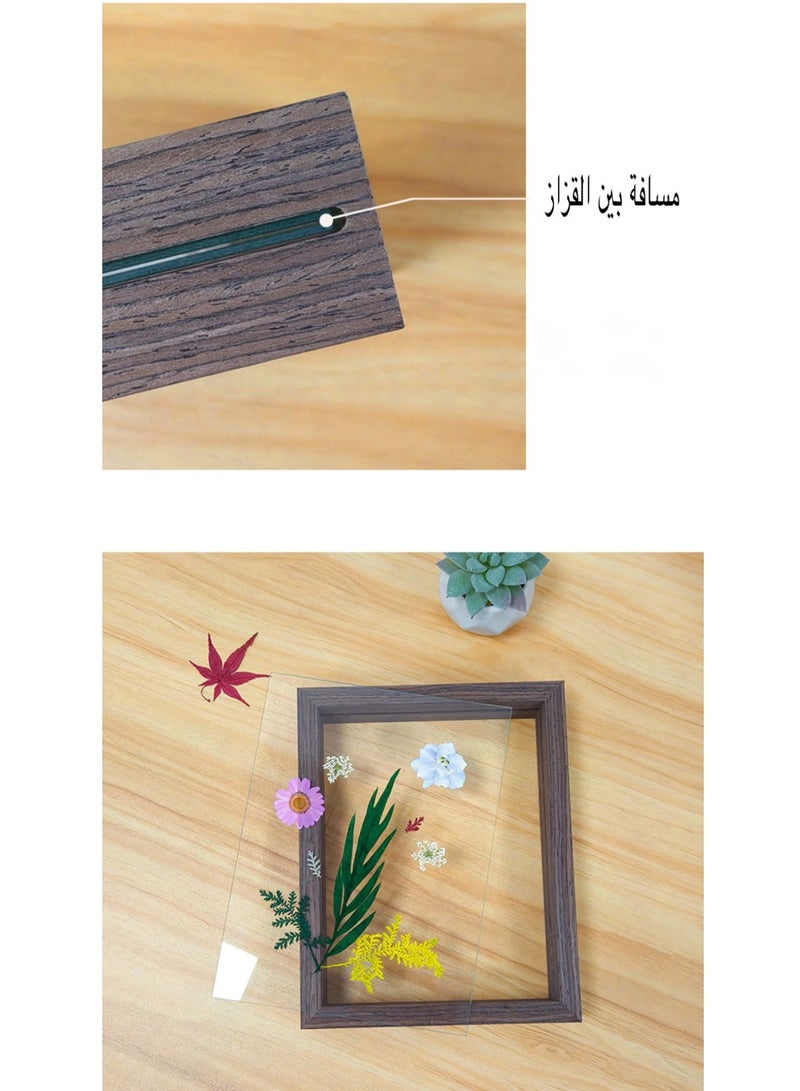 A picture frame with leaves visible from both sides in dark brown in different sizes