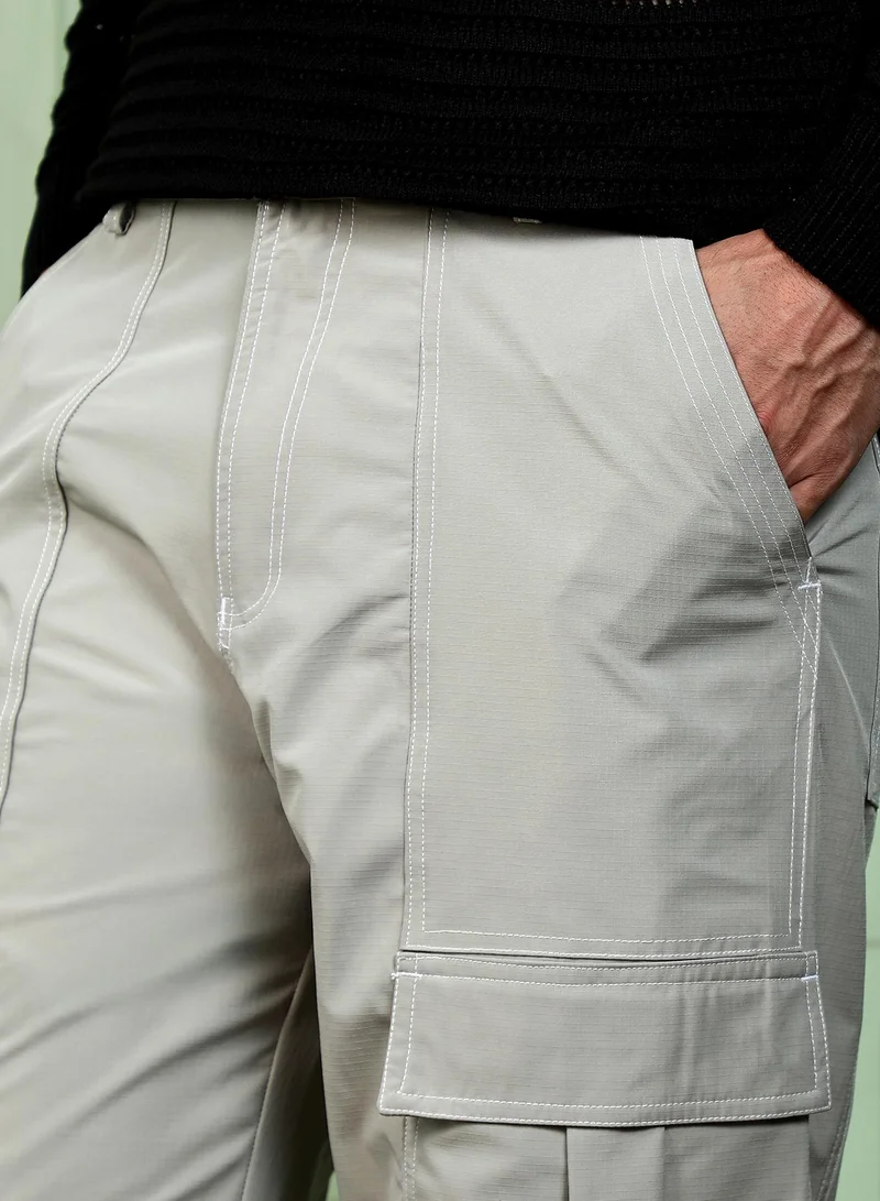 Campus Sutra  Men Contrast-Stitch Utility Trousers | Mid-Rise, Straight-Fit | Button Closure, Straight Hem | Solid Plain Woven Fabric For Casual & Daily Wear | Cloud Grey for Men | Best Price UAE