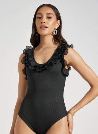 Solid Knit Sleeveless Bodysuit with Ruffles - pzsku/Z4F855E1343B296C26B00Z/45/_/1716833803/cd8e1dde-e2a8-40e7-a20a-50b2111090c2