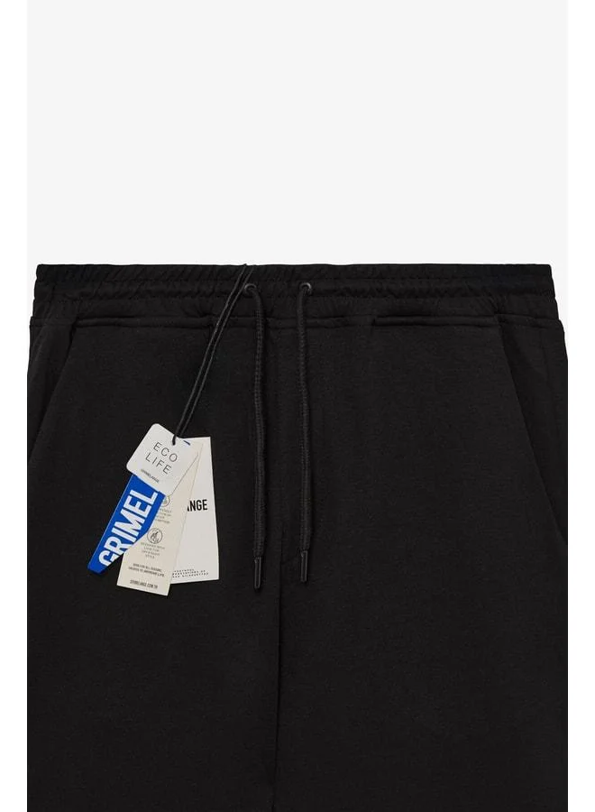 GRIMELANGE LAMARE Men's waist-elastic, side-pocket, regular fit black sweatpants.
