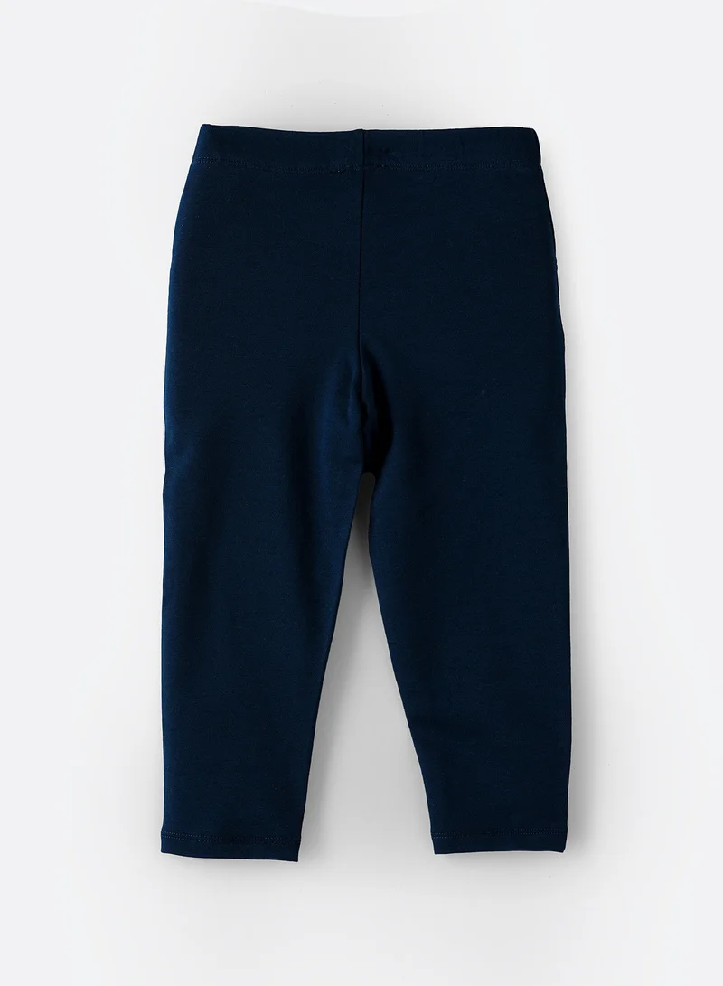 جيلين بنطال ضيق محبوك بطبعة عند الركبة