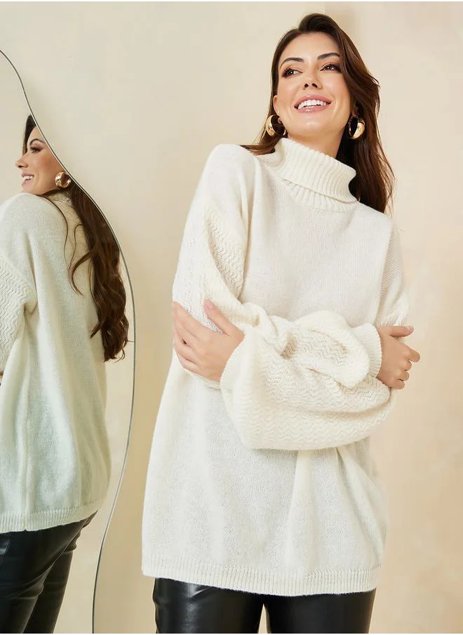 ستايلي Oversized Volume Sleeve Turtle Neck Sweater