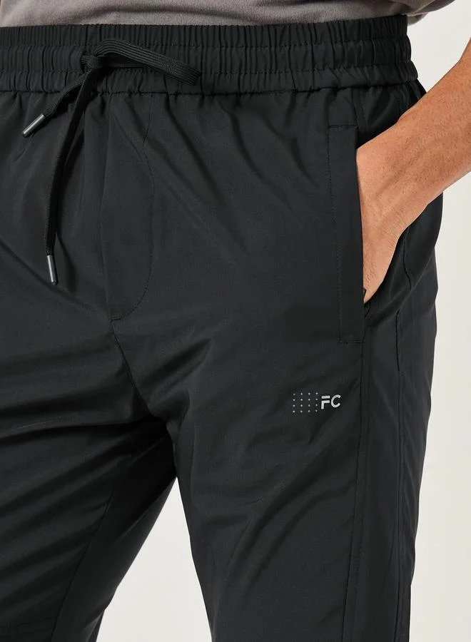 Fort Collins Mid Rise Regular Fit Track Pant with Drawstring by Styli